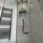 a shower with a shower head